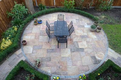 Outdoor dining space with paver surface
